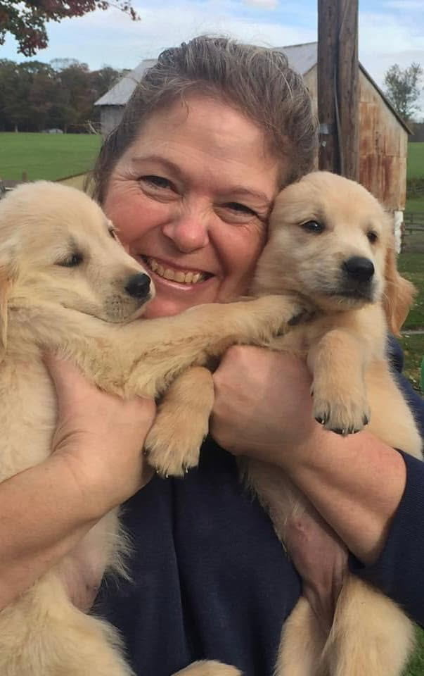 Girl with Puppies